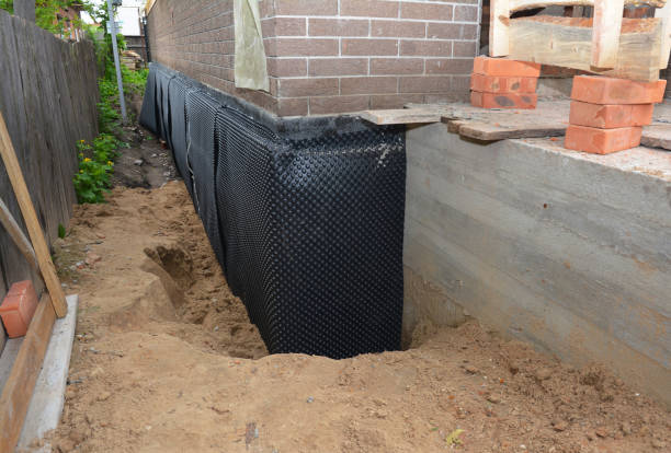 SJ Waterproofing Pros technician performing targeted Waterproofing assessment in Stratford, NJ